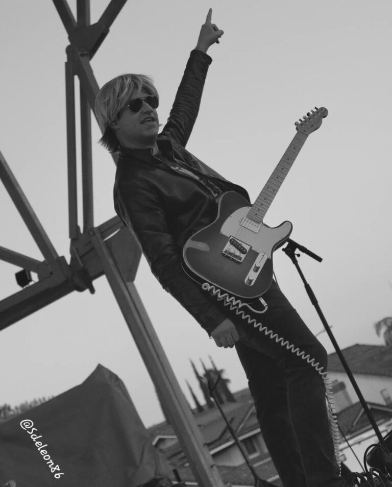 Christian Hernandez as Andy Summers performing at the City of Walnut Summer Concert Series with The Police Academy Tribute.